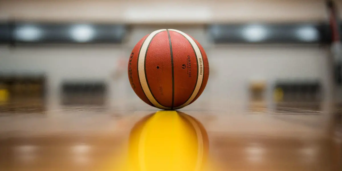A basketball in the centre of the court at Christchurch Recreation and Sport.