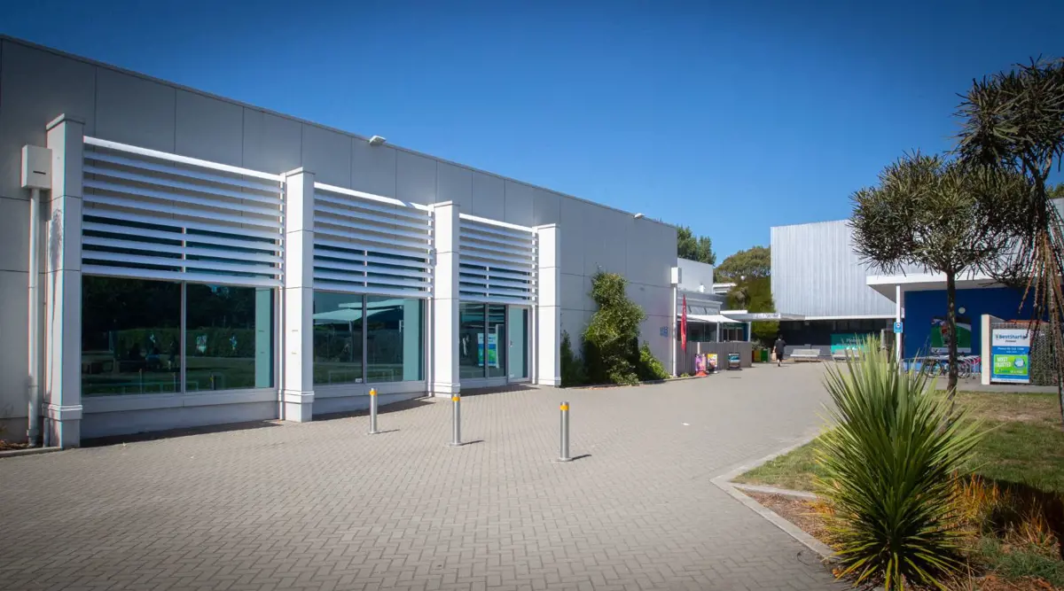 The outside of Pioneer Recreation and Sport centre along the walkway.
